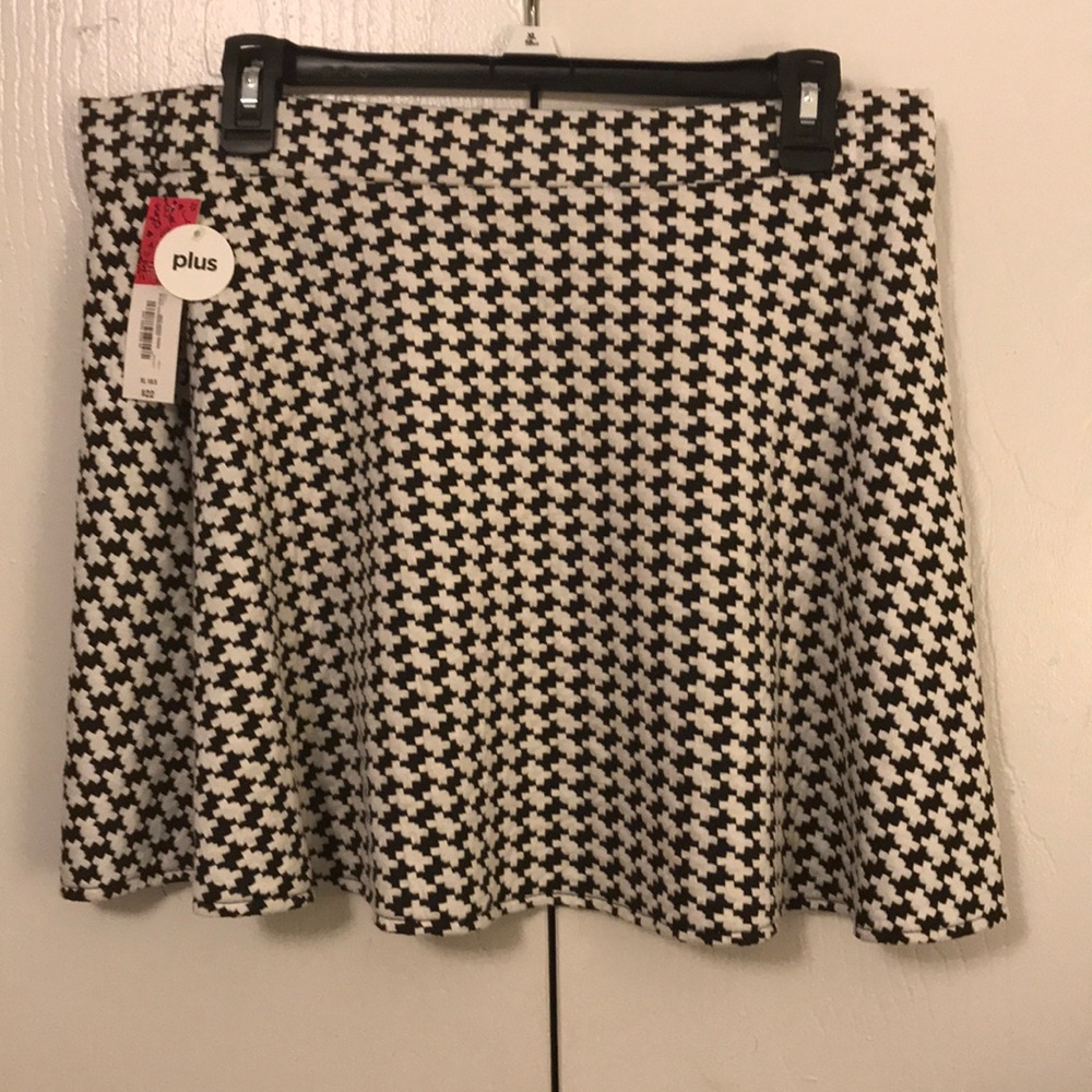 Girls black and white skirt.